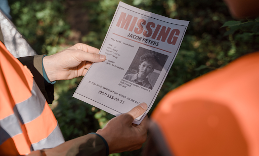 Someone-viewing-a-missing-person-flier.